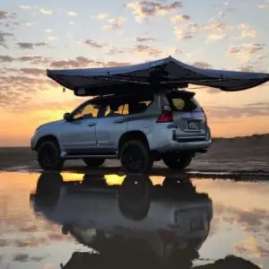 Wind resistant 270 degree awning UAE installed on a 4x4 overland vehicle in the desert